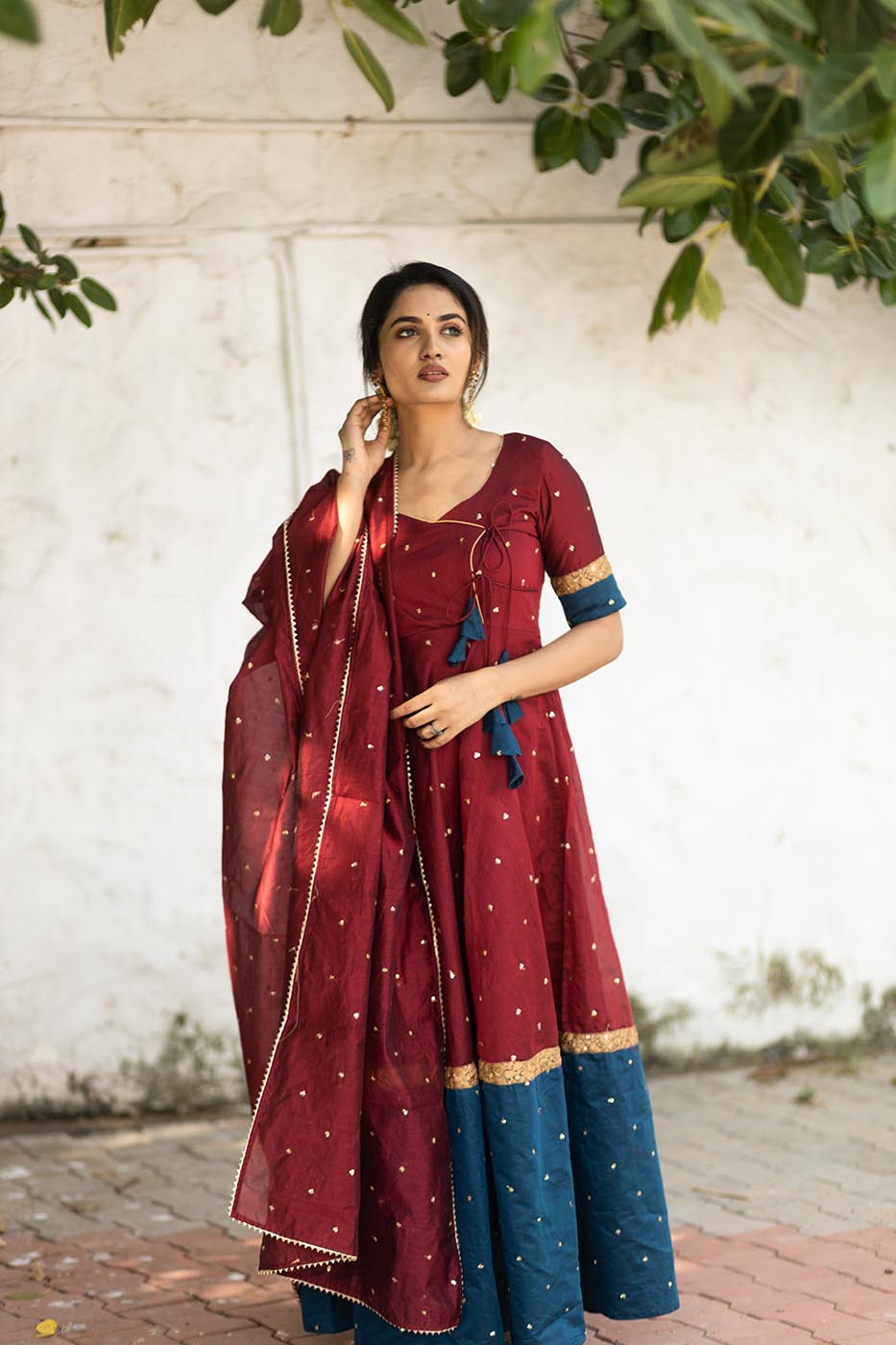 Beautiful red and blue sequin embellished long ethnic dress with dupatta for women. Stylish Indian festive wear for any special occasion. Look glamorous in this silk anarkali dress.