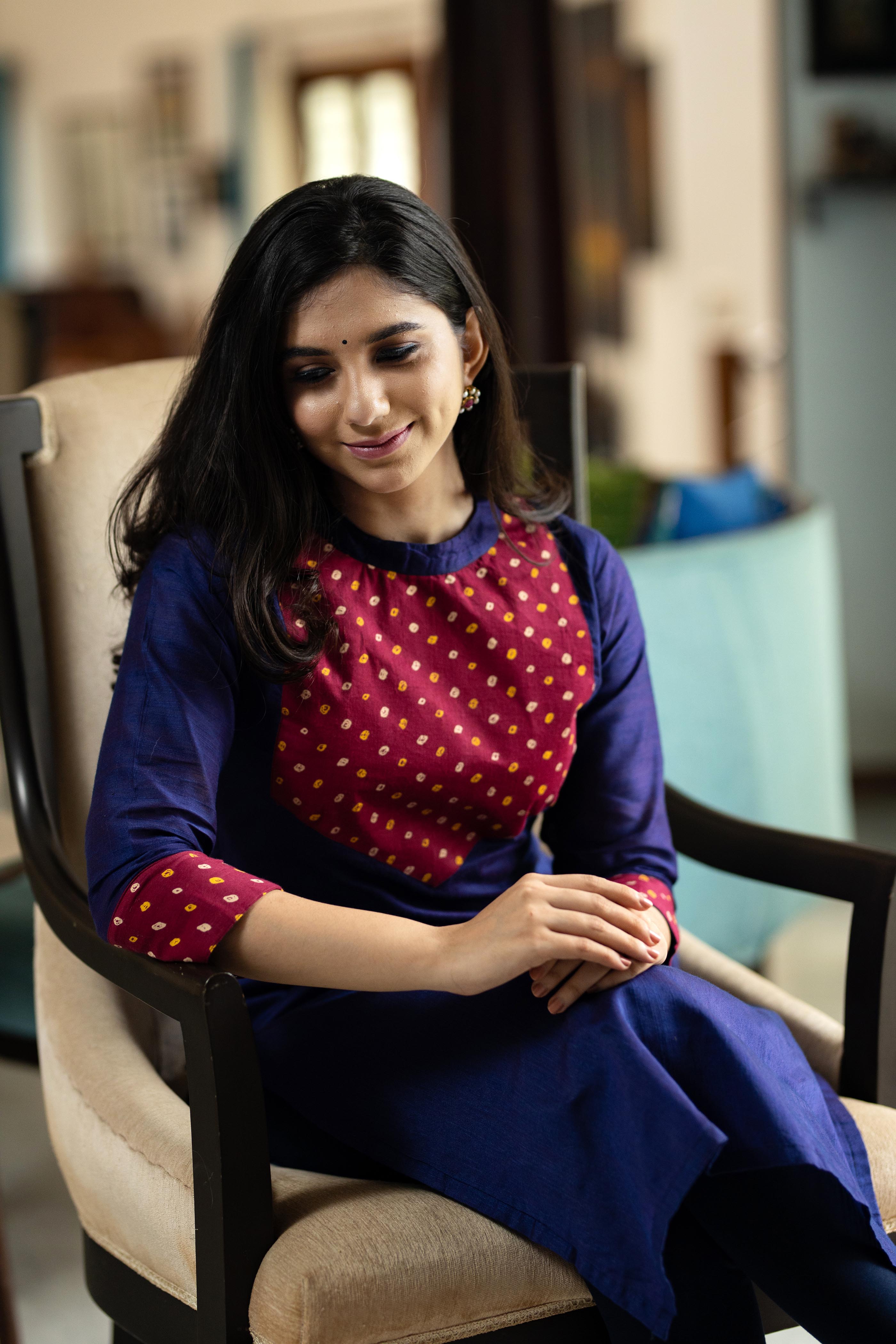 Shop stylish blue kurti with bandini yoke for work or office wear. Simple yet designer collar kurti in cotton suitable for formal or casual occasions.