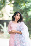 A stylish light pastel pink soft silk kurti with blue floral organza dupatta for women. This contemporary ethnic kurta features trendy sequin work and embroidery.