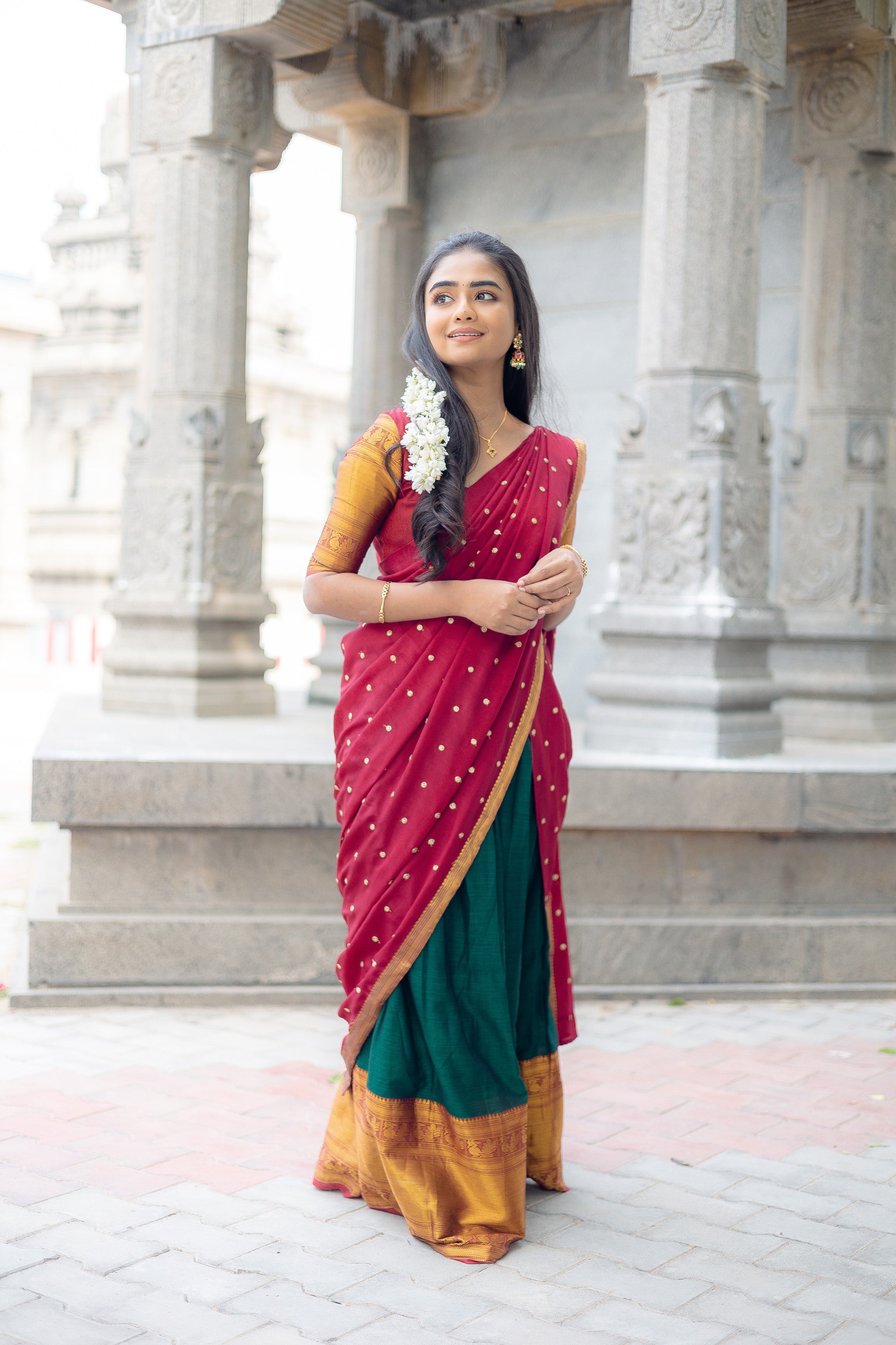 Elegant ethnic woman wearing silk sari standing on river shore · Free Stock  Photo