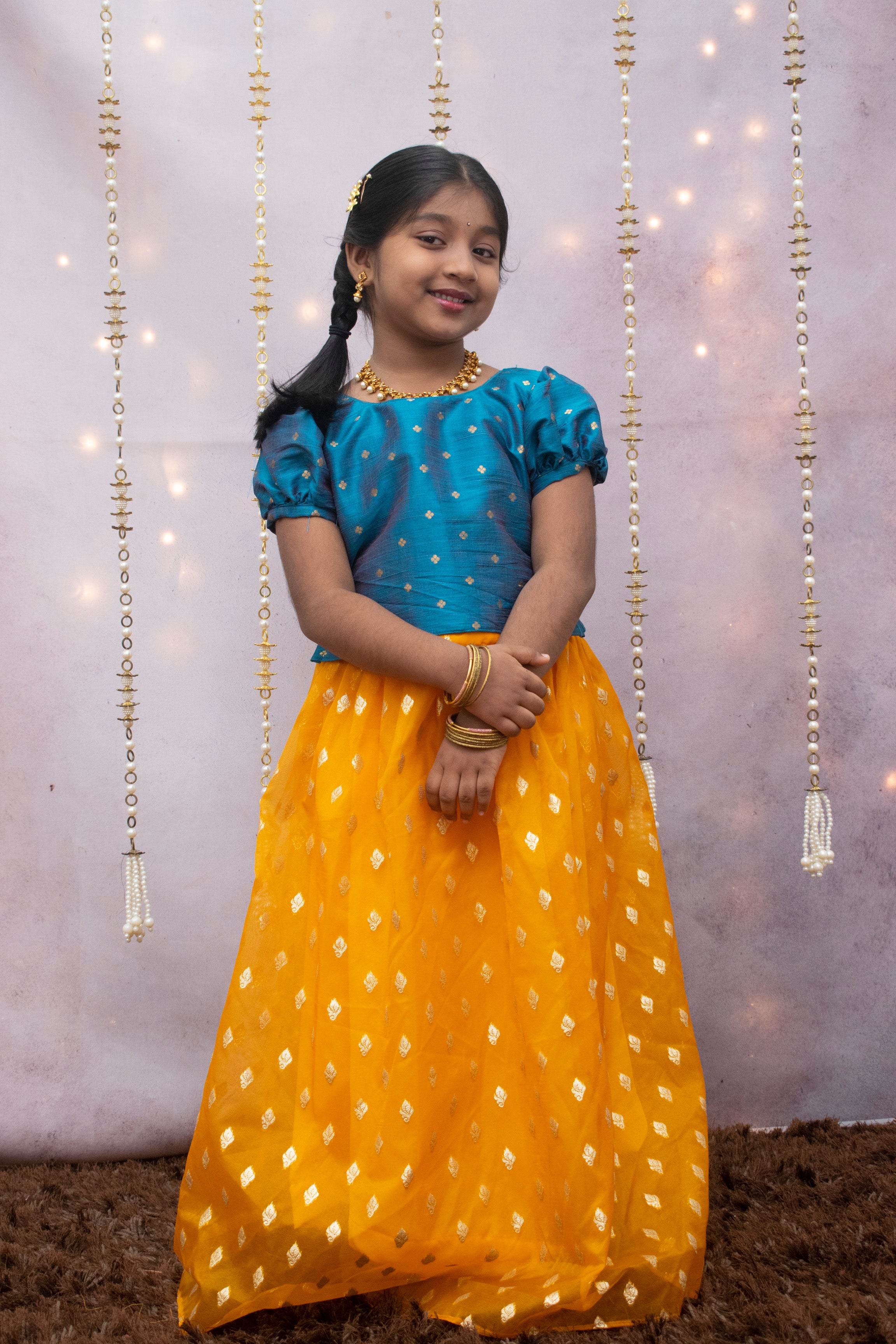 Naiyanika blue top and yellow skirt mini