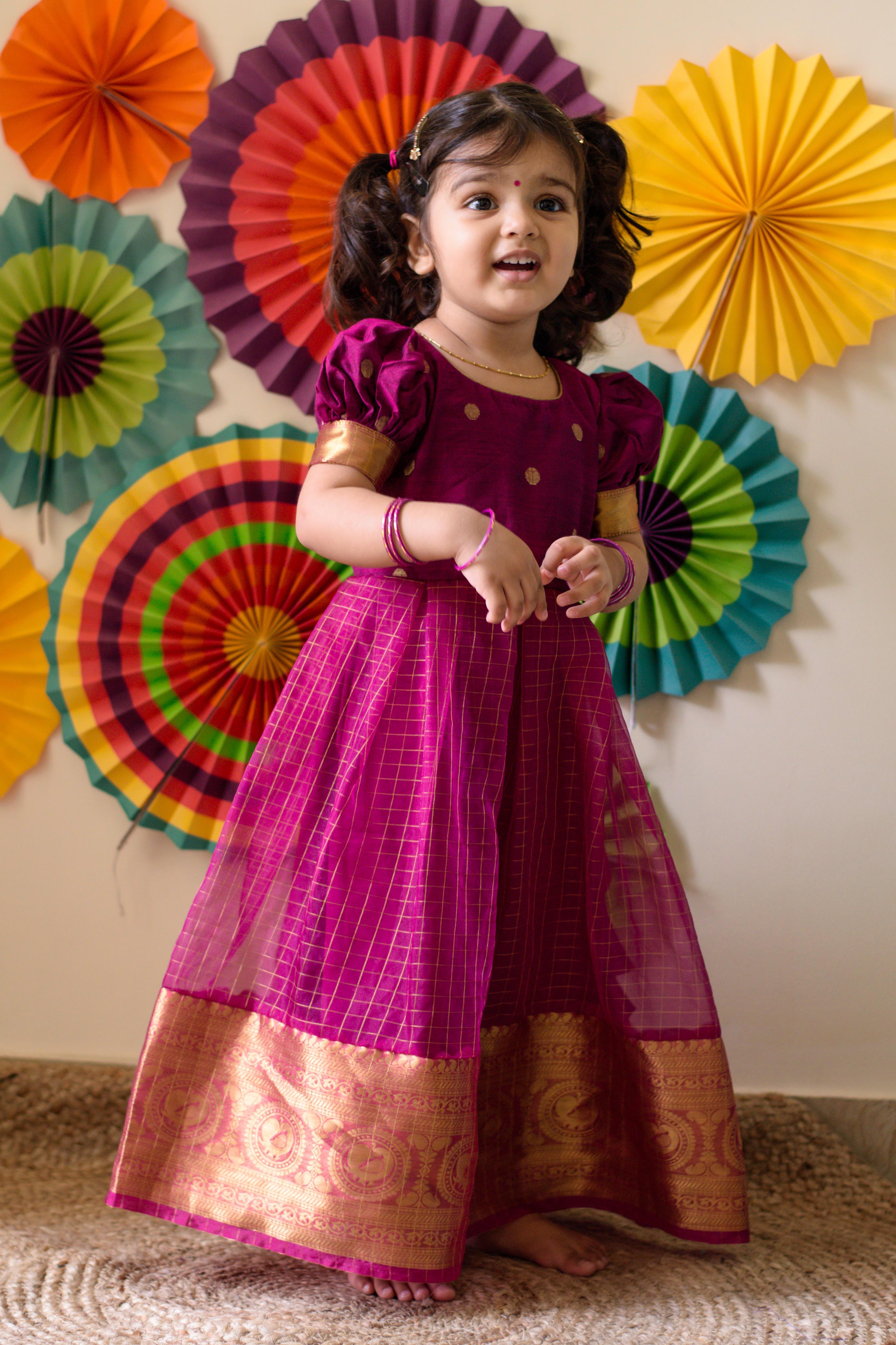 Find the perfect special occasion outfit for your little girl. Shop this cute Indian girl frocks made of chanderi and organza for her special day. Choose from an array of designer baby and children’s clothes online.