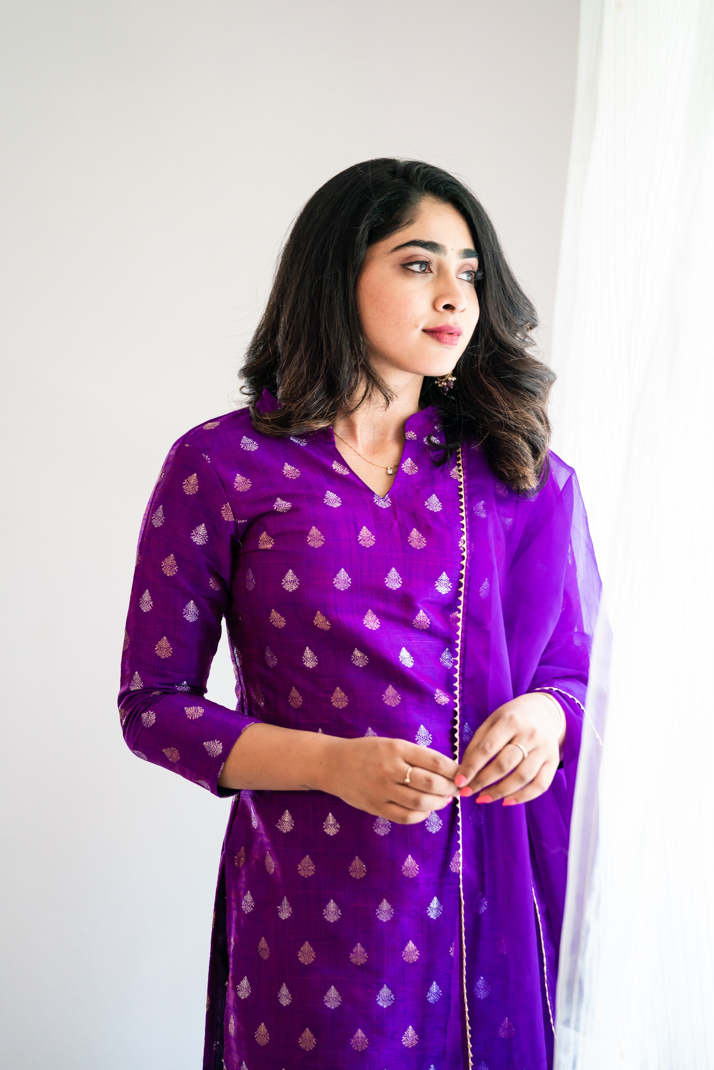 Elevate your ethnic wardrobe with a designer purple raw silk kurti with dupatta. Get an elevated look with our close-neck kurtis for women and enjoy comfort & style. Shop now!