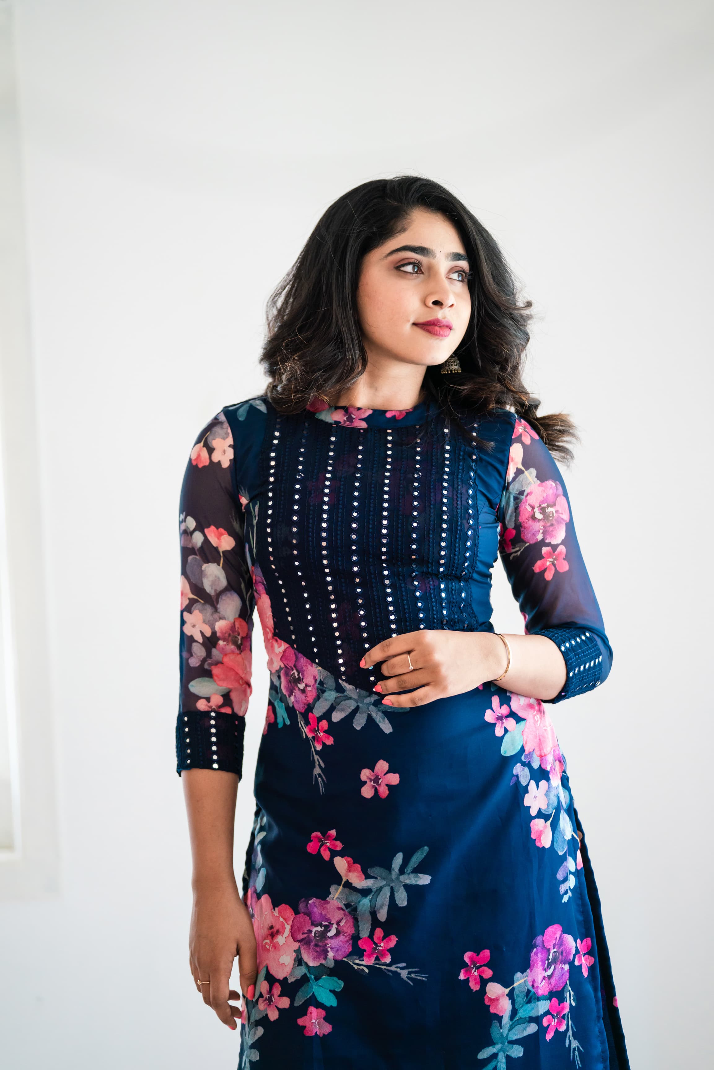 Shop the newest collection of floral printed blue organza collar kurtas for women. Featuring mirror embellished yoke and 3/4th sleeves, this beautiful kurta is perfect for any occasion. Get yours today only at Ekanta!